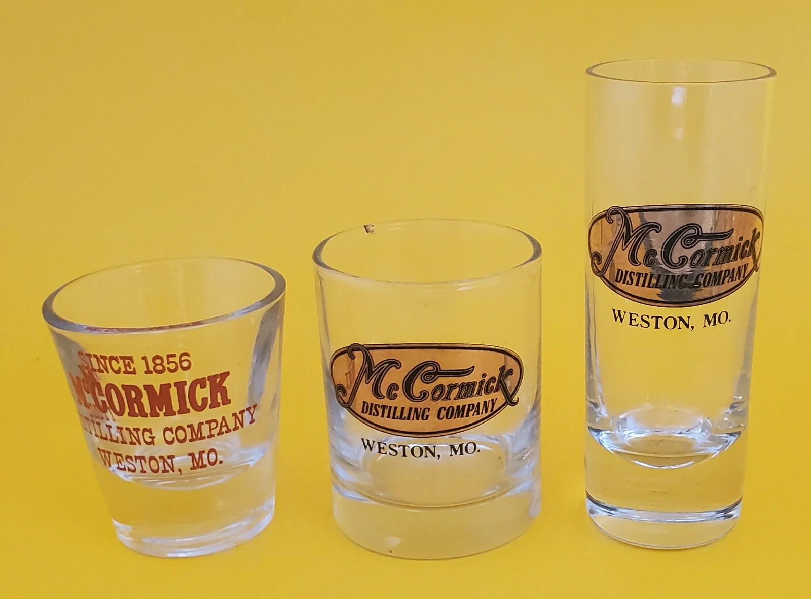 3 DIFFERENT VINTAGE McCORMICK DISTILLING COMPANY WESTON, MO SHOT GLASSES