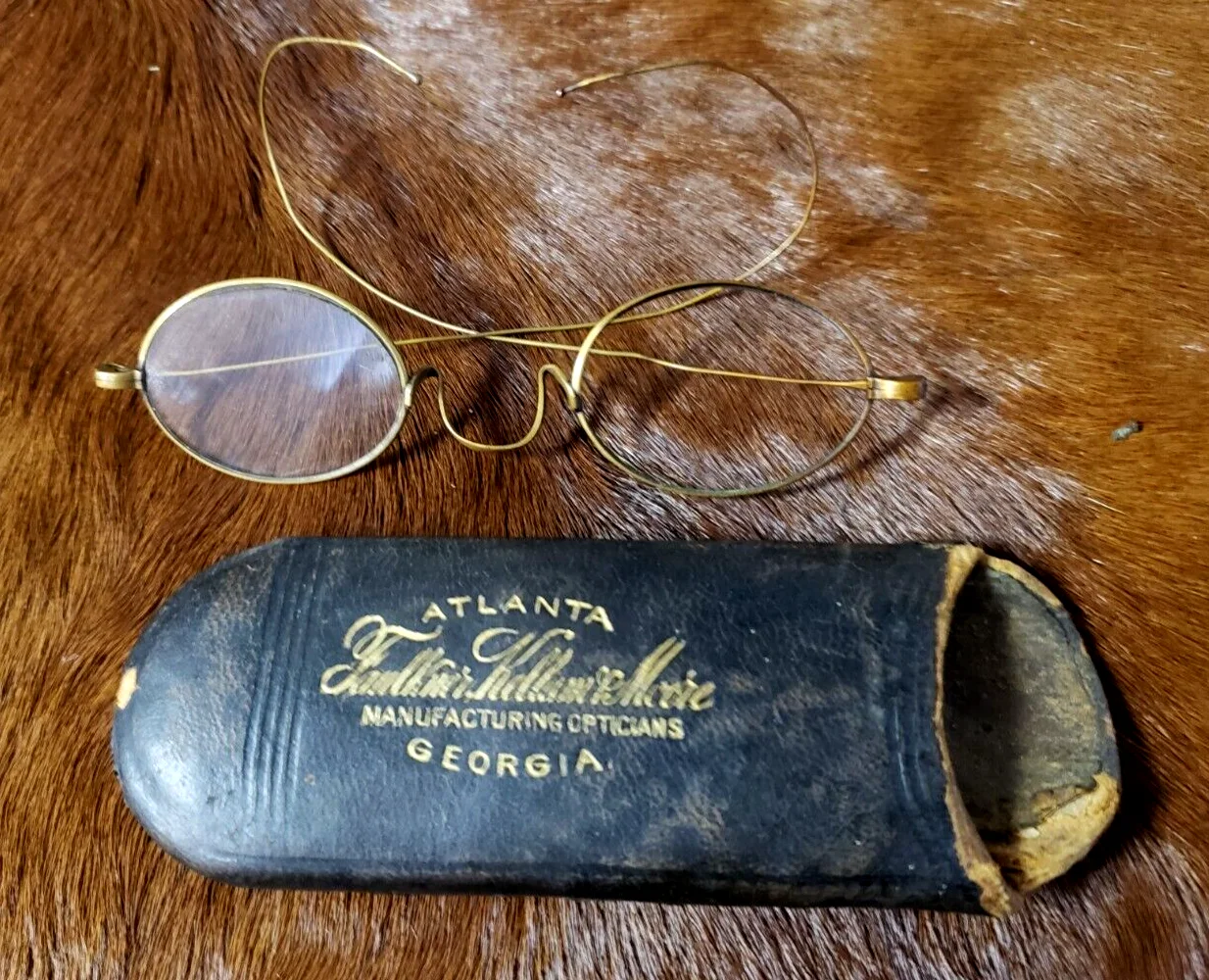 antique glasses in case