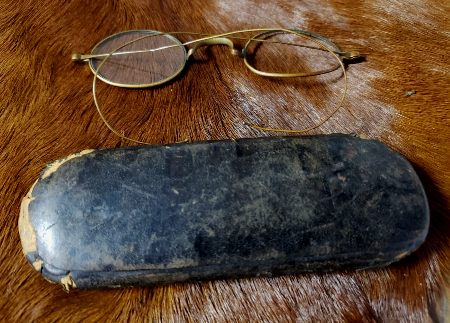 antique glasses in case 3