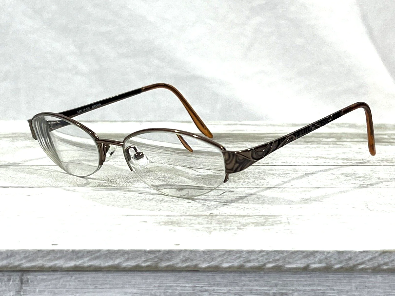 Bulova Tarragona Womens Oval Eyeglass Frames Half Rim Brown 53▯17-135
