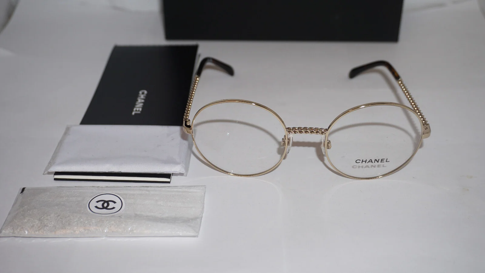 CHANEL Eyeglasses New Pale Gold Round w/ Chain Demo Len CH2186 C395 47 21 135 3