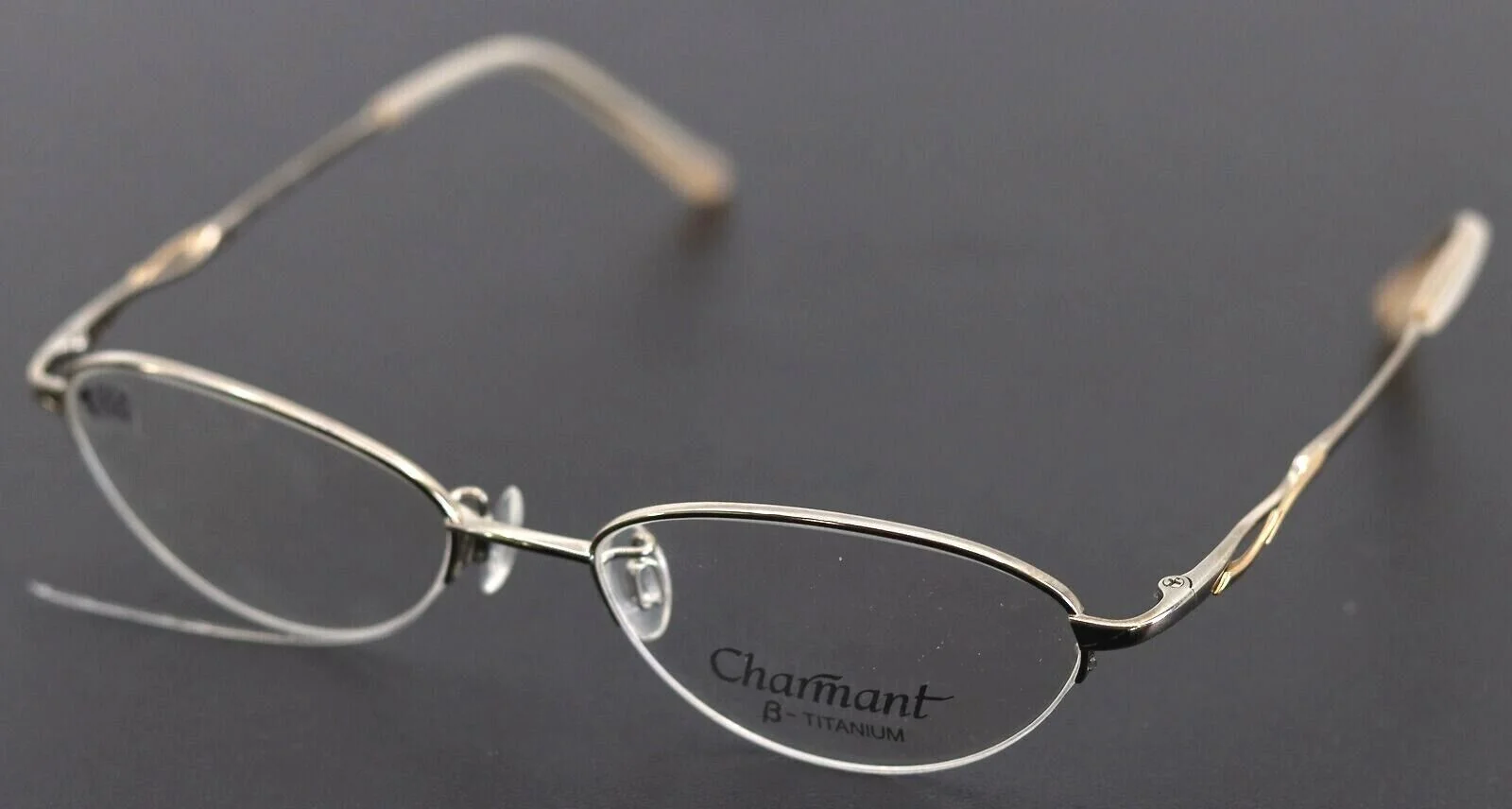 Charmant AA3862 WP White Platinum Oval Womens Titanium Eyeglasses 51-17-135