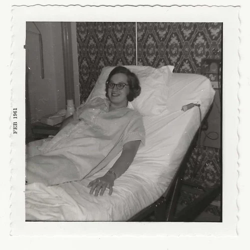 Cute Woman Wearing Cat Eye Glasses Lying In Hospital Bed Vintage Snapshot Photo