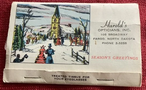 ephemera Christmas ad Fargo North Dakota opticians tissue for eyeglasses