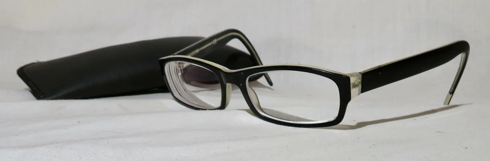 Essential EN6653 eyewear 50-17-140 Black/crystal eyeglass frame parts or repair