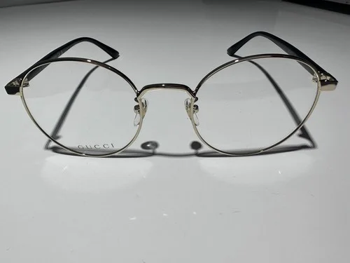 GUCCI GG0297Ok 001 Round Oval Gold Shiny Black Demo Lens 52 mm Unisex Eyeglasses