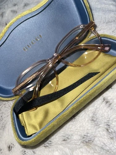 Gucci GG0566O Women