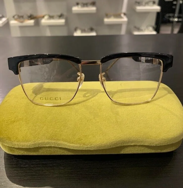 GUCCI GG0605O. Black and Gold Square/Clubmaster style Eyeglasses