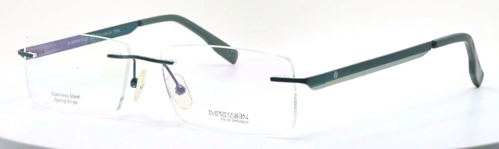 IMPRESSION R-IMPW-15-20 Teal Rectangular Rimless Womens Eyeglasses 55-17-140