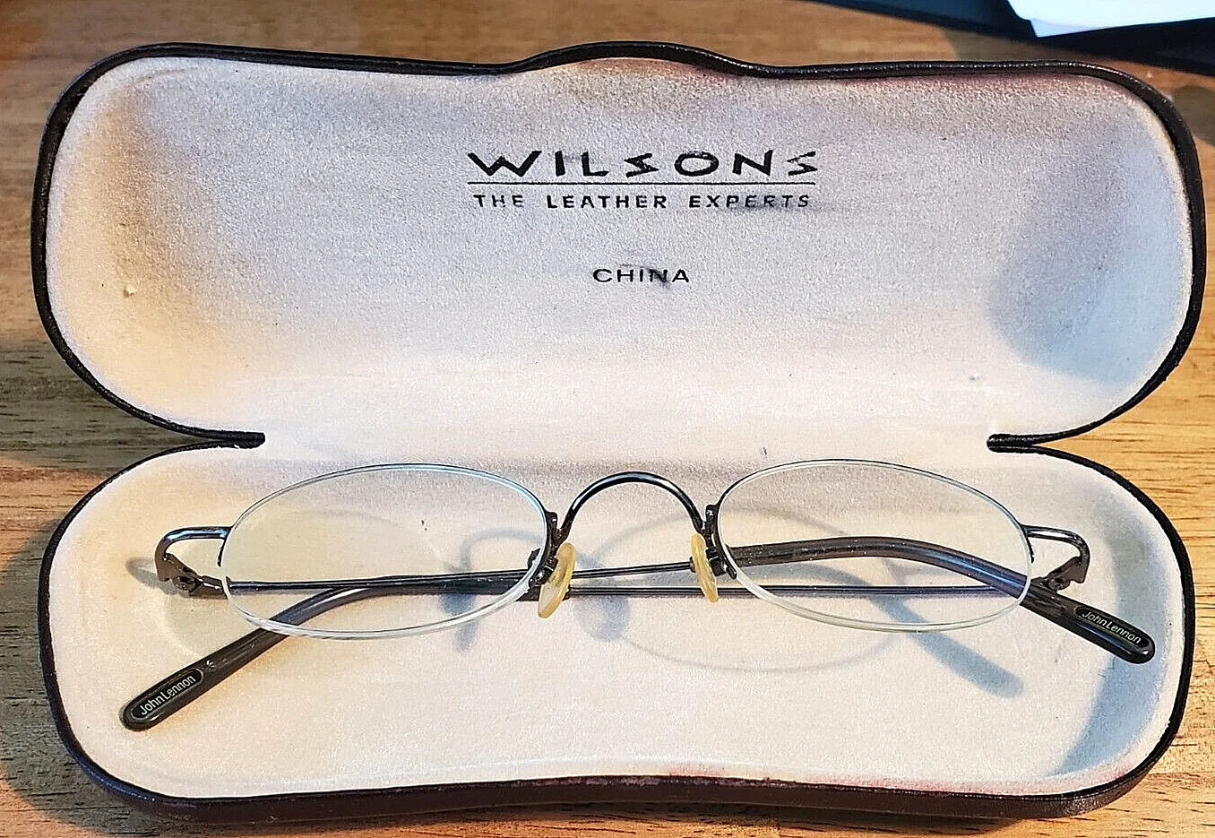John Lennon Eyeglass Frames with a Leather Wrapped Wilsons Hard Case