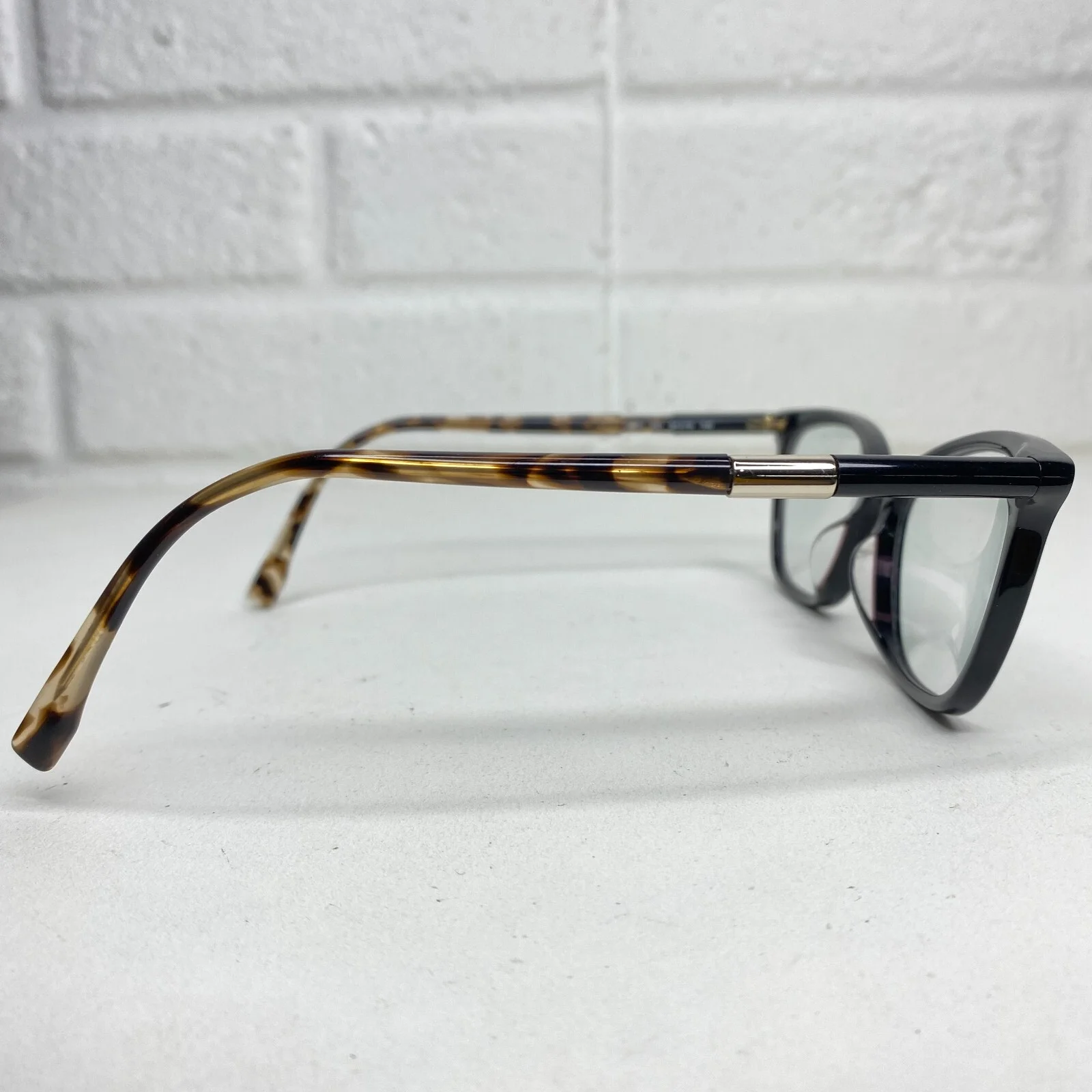 Lacoste Eyeglasses Frames Black Gold Women 3