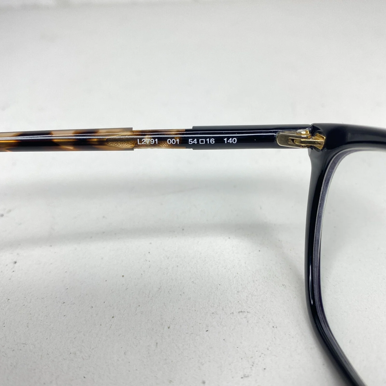 Lacoste Eyeglasses Frames Black Gold Women 4