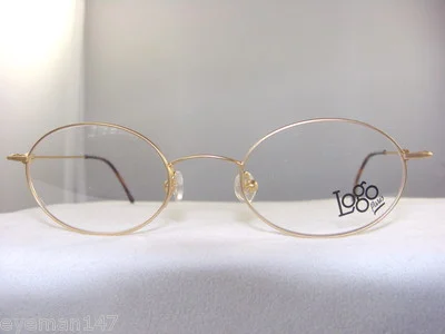 LOGO NX2440 OVAL EYEGLASS FRAME IN GOLD SIZE 47-20
