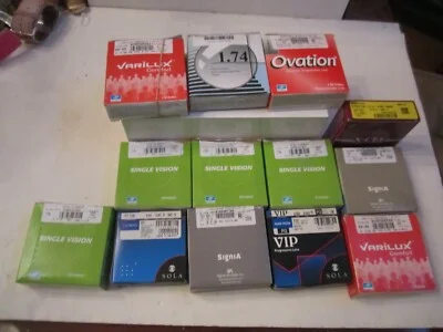 LOT OF 13 EYE GLASS LENSES IN THE ORIGINAL BOX - VARILUX, SOLA, ESSILOR, KODAK