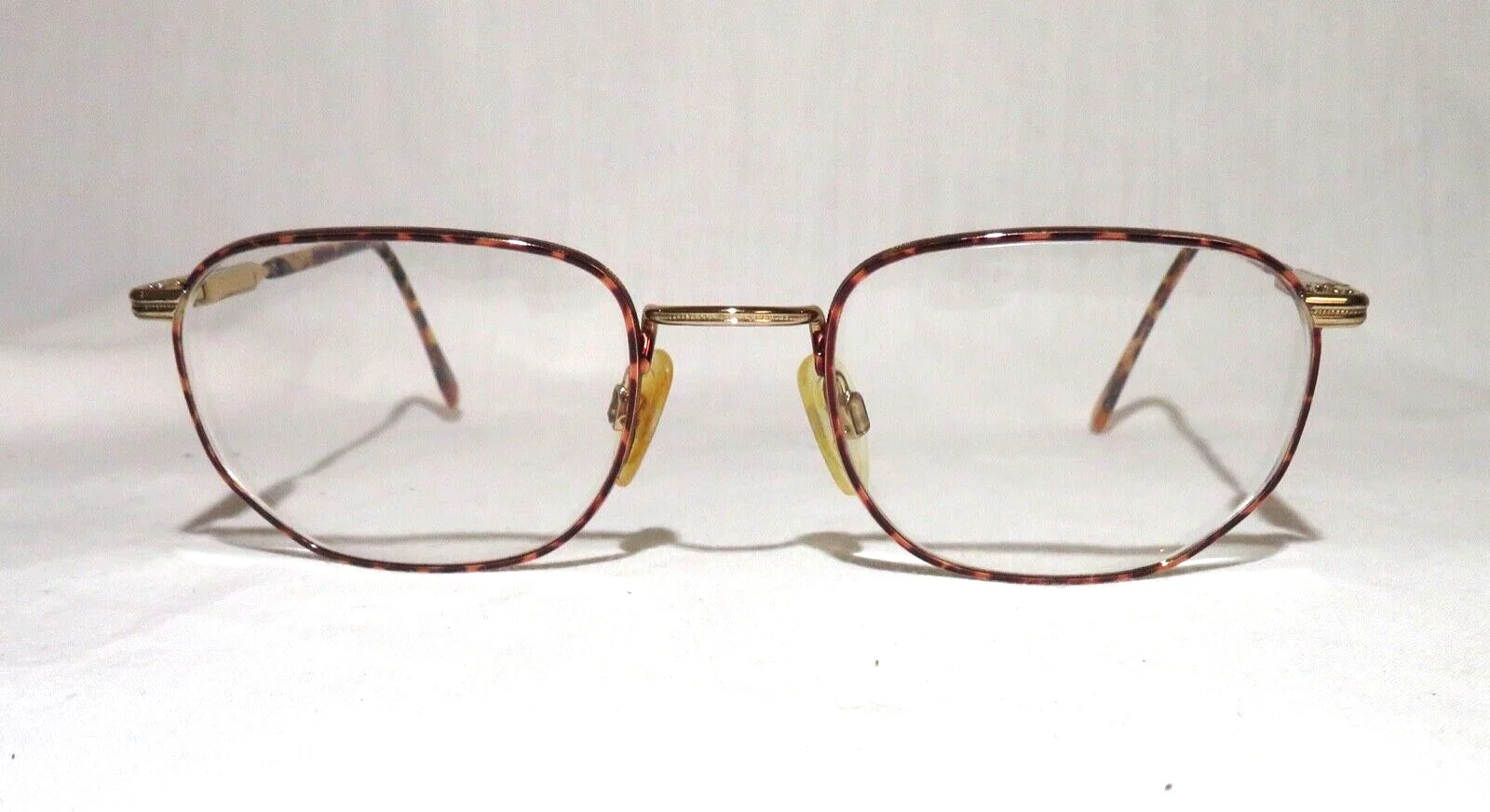 Luxottica Toledo eyeglass frames, 52-20-135 eyewear eyeglasses Gold/Darkshell