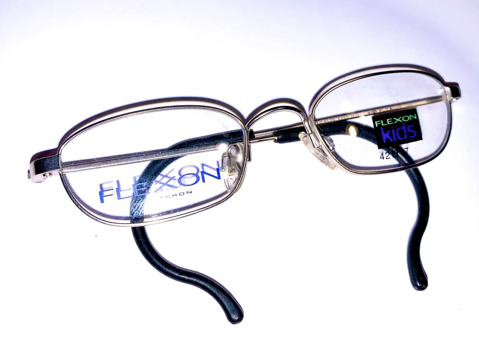 Marchon Flexon kids 91cc memory titanium eyeglass frames w/comfort cable temples