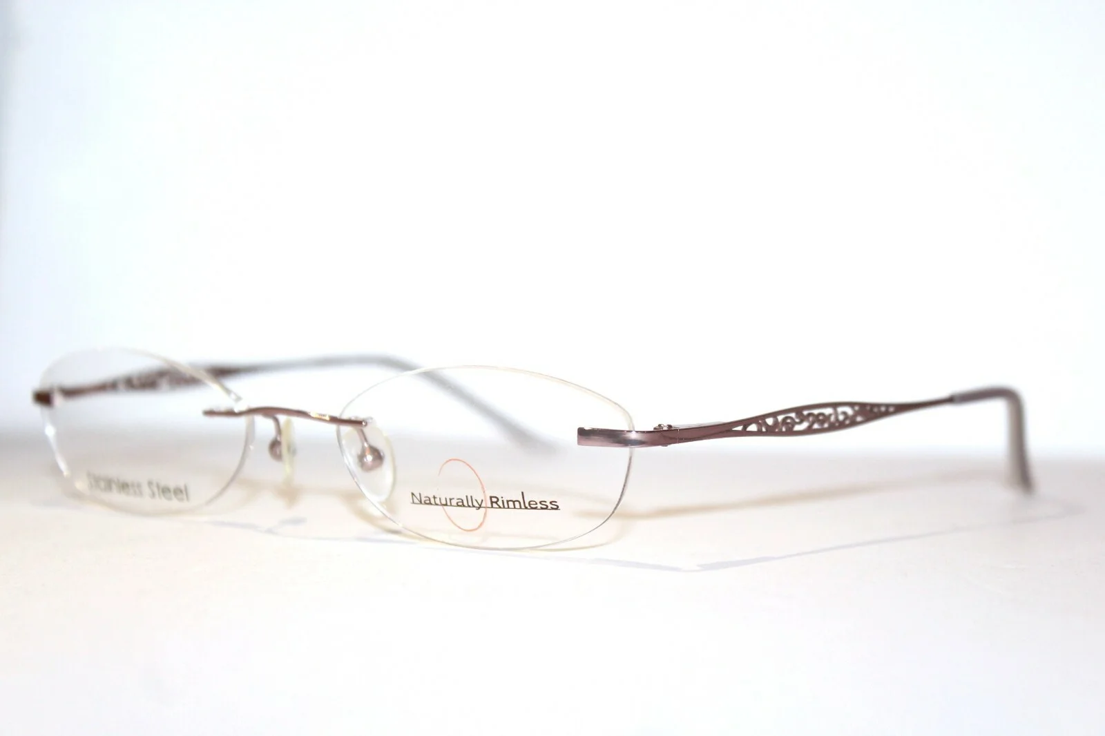NATURALLY RIMLESS NR334 LAVNDR LAVENDER PINK WOMENS EYEGLASSES RX 50-17-135 MM 2