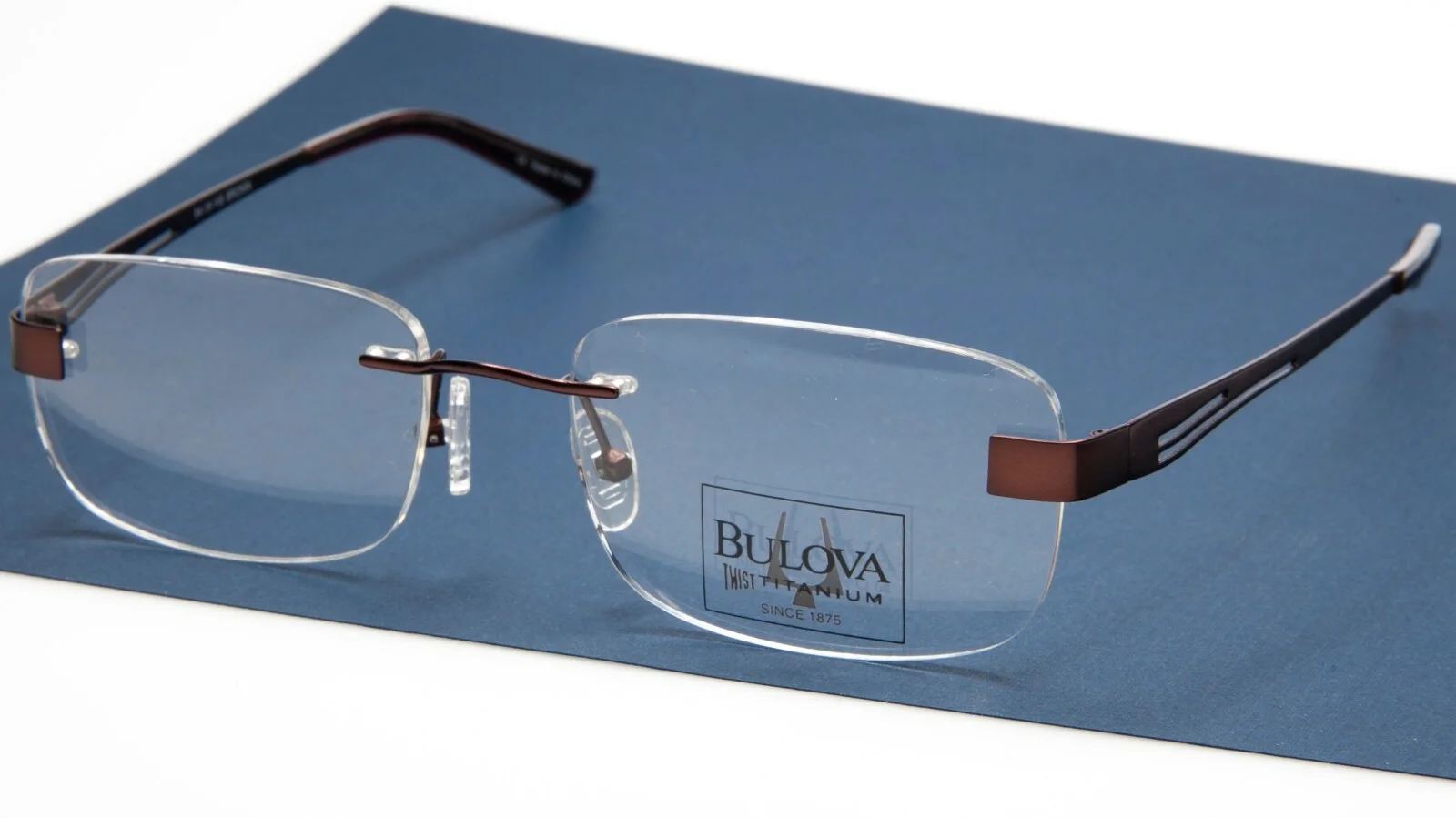 NEW BULOVA FARGO BROWN EYEGLASSES GLASSES TWIST TITANIUM 54-19-145 B35mm