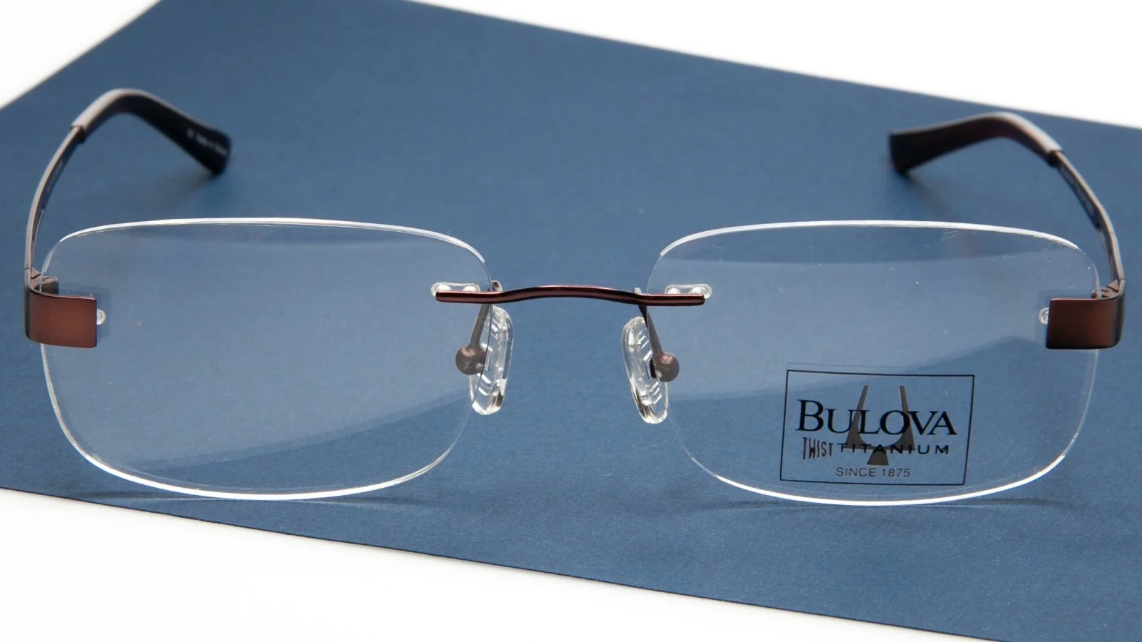 NEW BULOVA FARGO BROWN EYEGLASSES GLASSES TWIST TITANIUM 54-19-145 B35mm 2