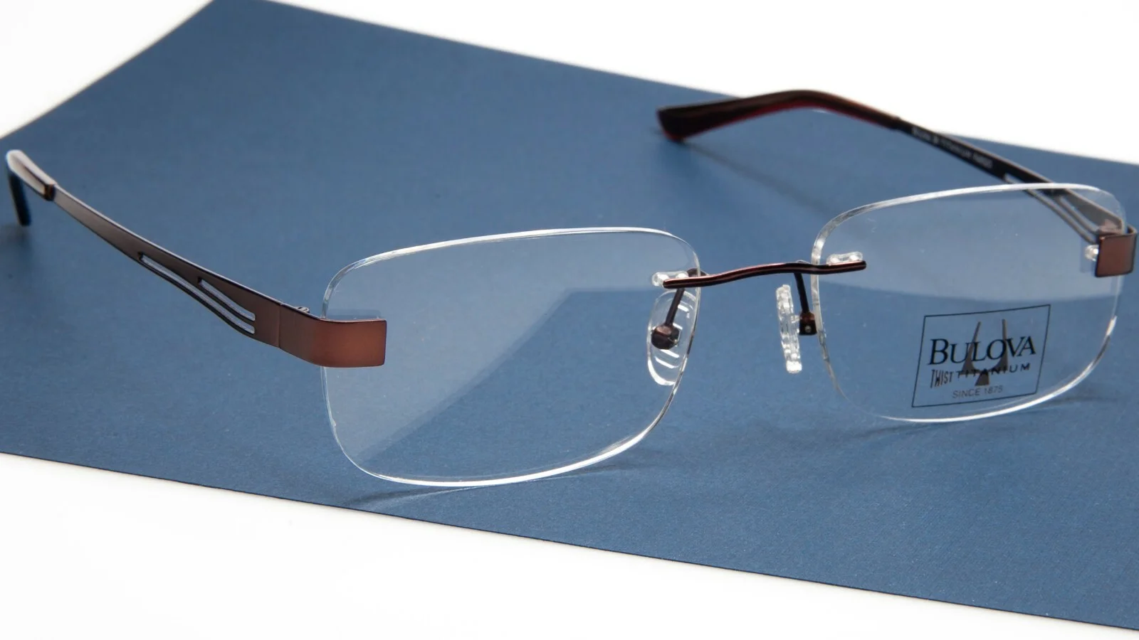 NEW BULOVA FARGO BROWN EYEGLASSES GLASSES TWIST TITANIUM 54-19-145 B35mm 3