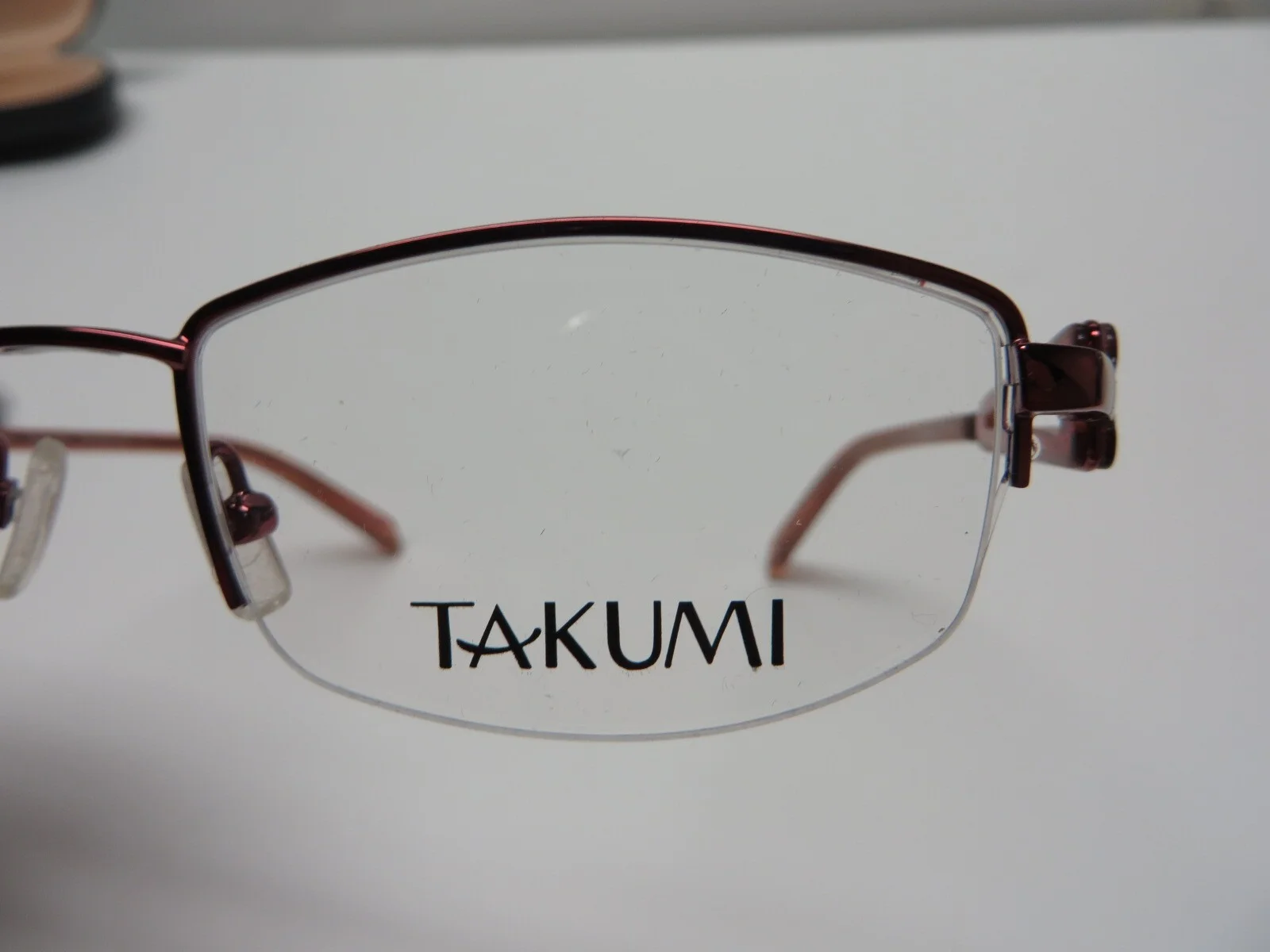 New Takumi red metallic half-rim frames with polarized magnetic clip 49-18-135 4