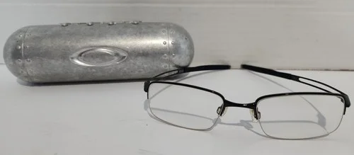 Oakley *Frag* Perscription EyeGlass Frame Only Polished Black & Silver Clam Case