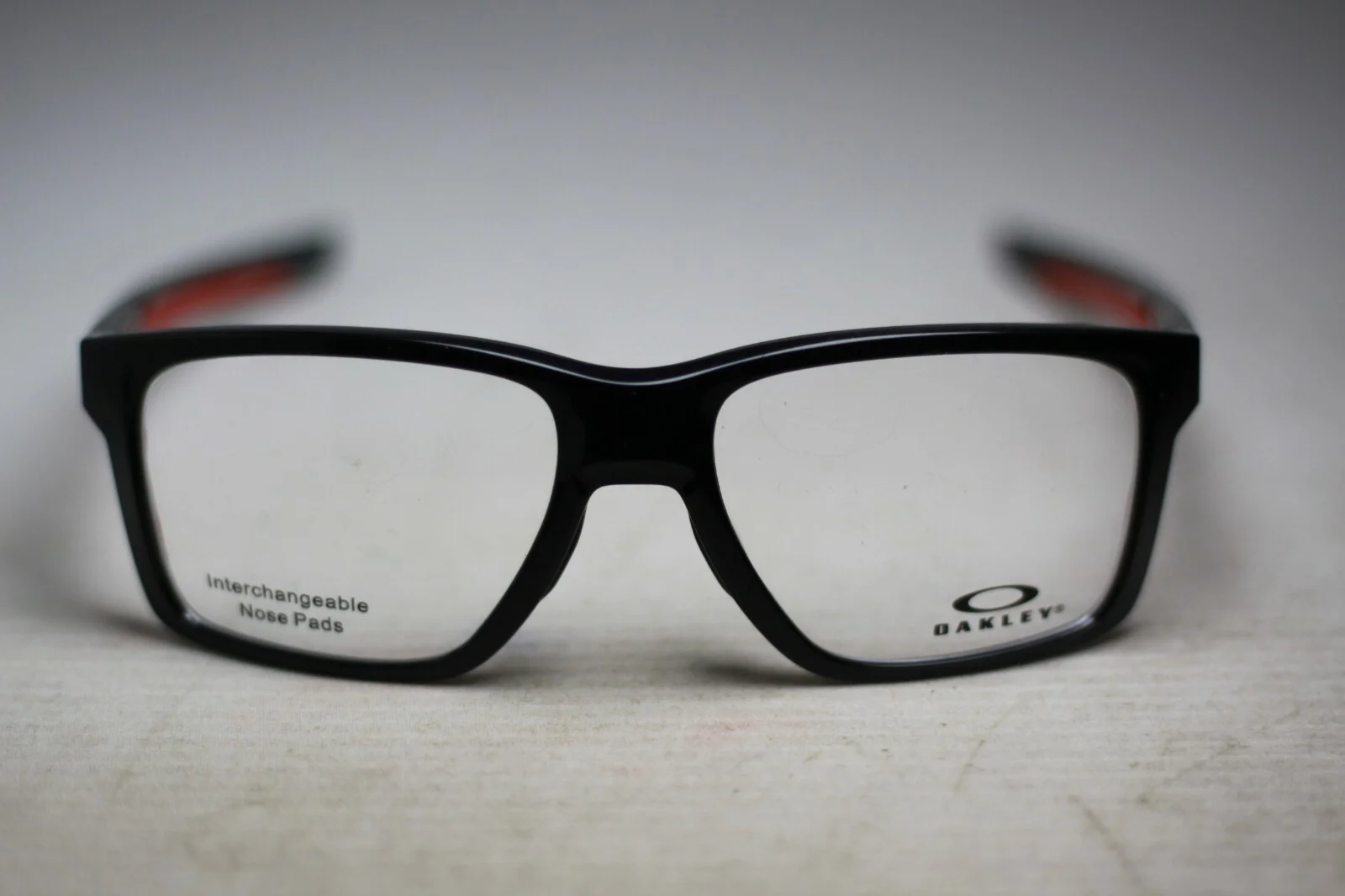 Oakley OX8128 0257 Mainlink Polished Black/Red 56-17-138 9519