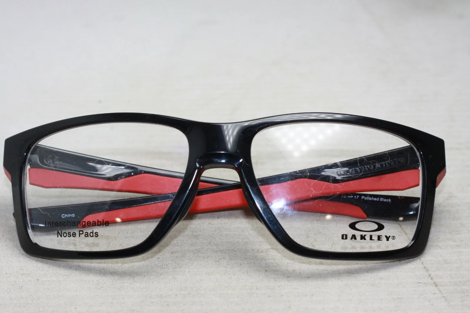Oakley OX8128 0257 Mainlink Polished Black/Red 56-17-138 9519 4