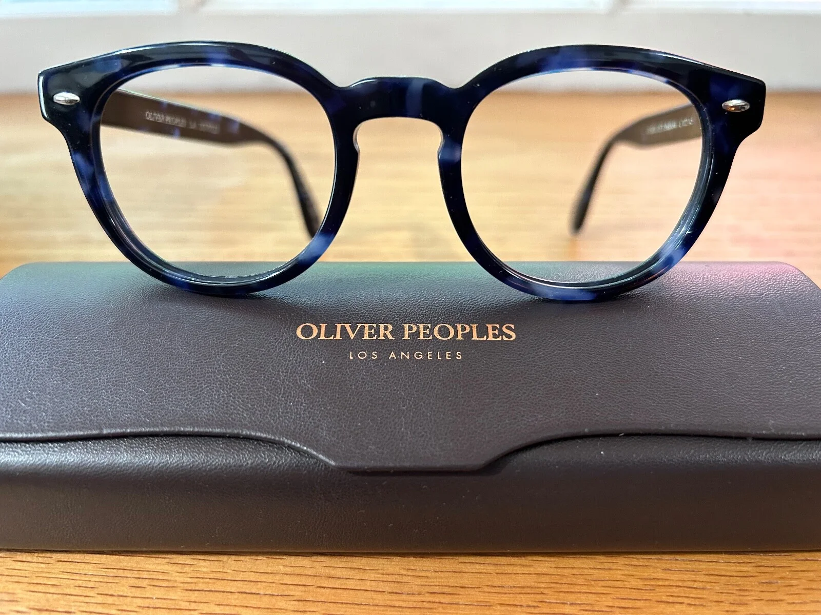 Oliver Peoples Italian-made lensless glasses frames
