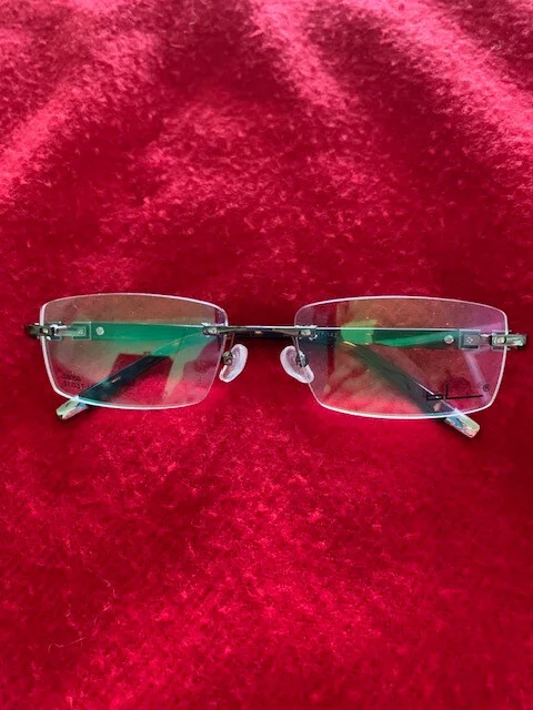 PRESCRIPTION EYEGLASS FRAMELESS, REALLY PRETTY WITH SILVER AND BLACK TRIM