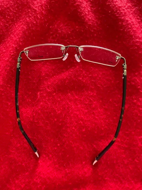 PRESCRIPTION EYEGLASS FRAMELESS, REALLY PRETTY WITH SILVER AND BLACK TRIM 3