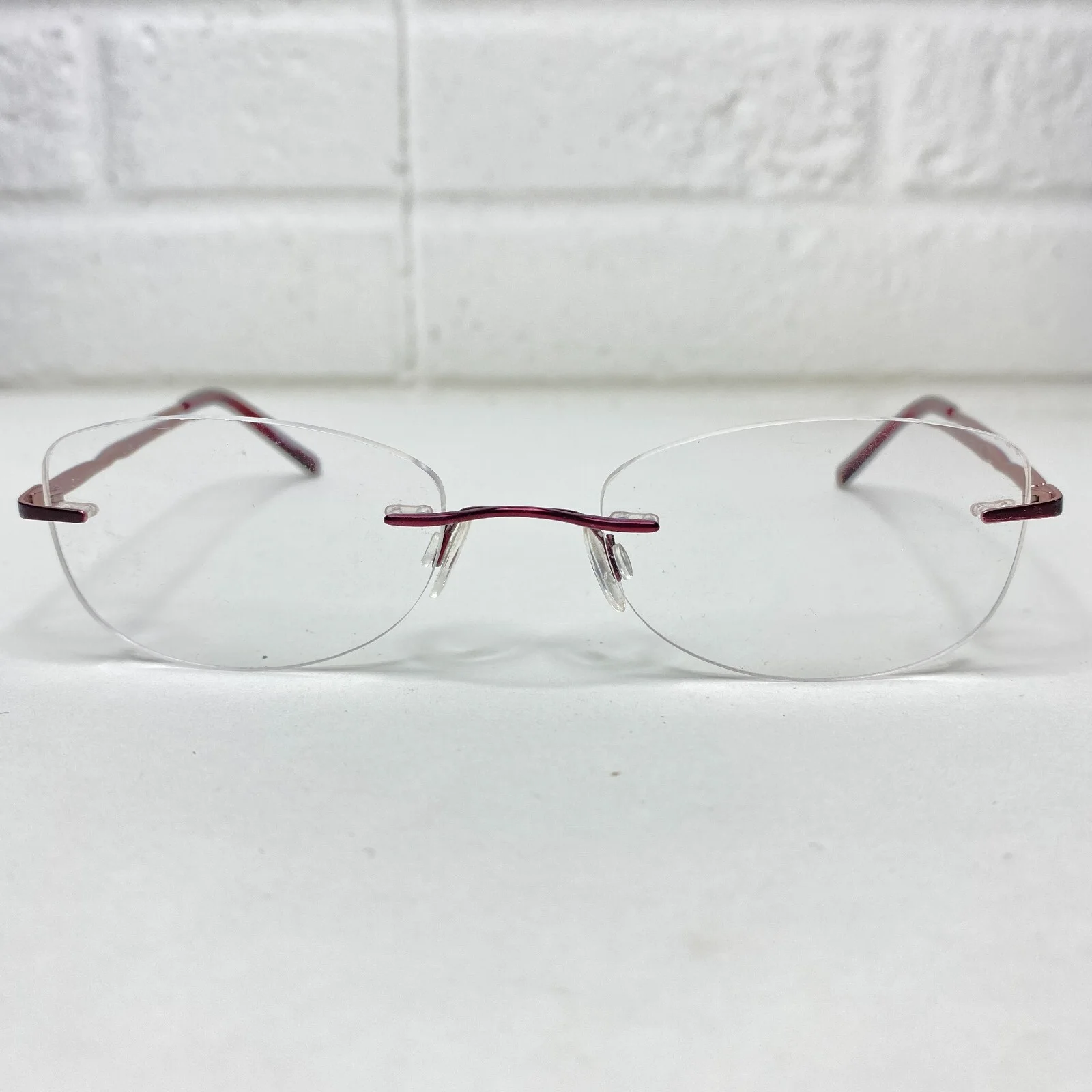 Radiance Eyeglasses Frames Arloc Red metal Rimless 047 49-18-135 14845