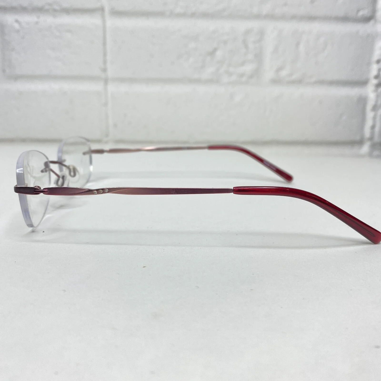 Radiance Eyeglasses Frames Arloc Red metal Rimless 047 49-18-135 14845 2