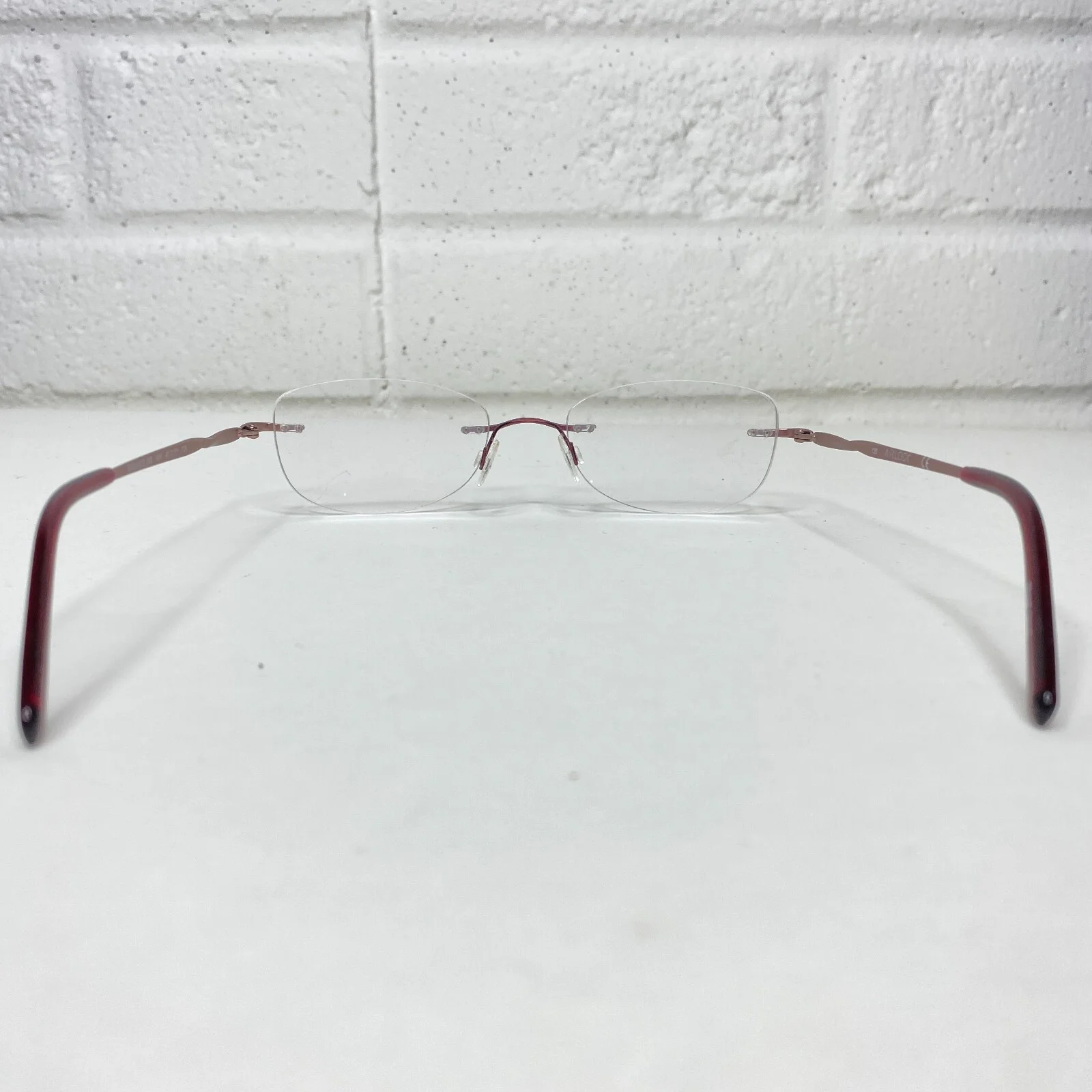 Radiance Eyeglasses Frames Arloc Red metal Rimless 047 49-18-135 14845 3