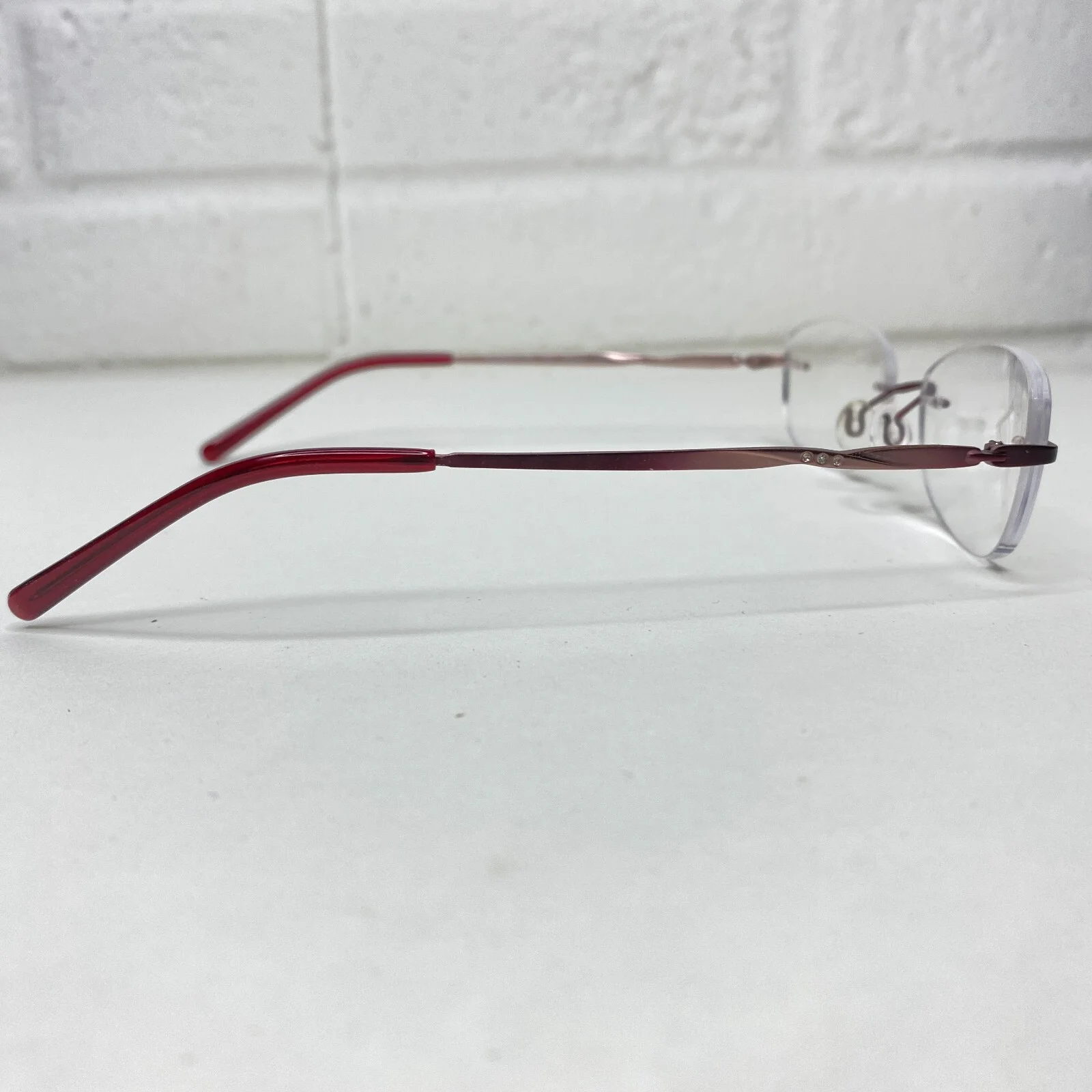 Radiance Eyeglasses Frames Arloc Red metal Rimless 047 49-18-135 14845 4