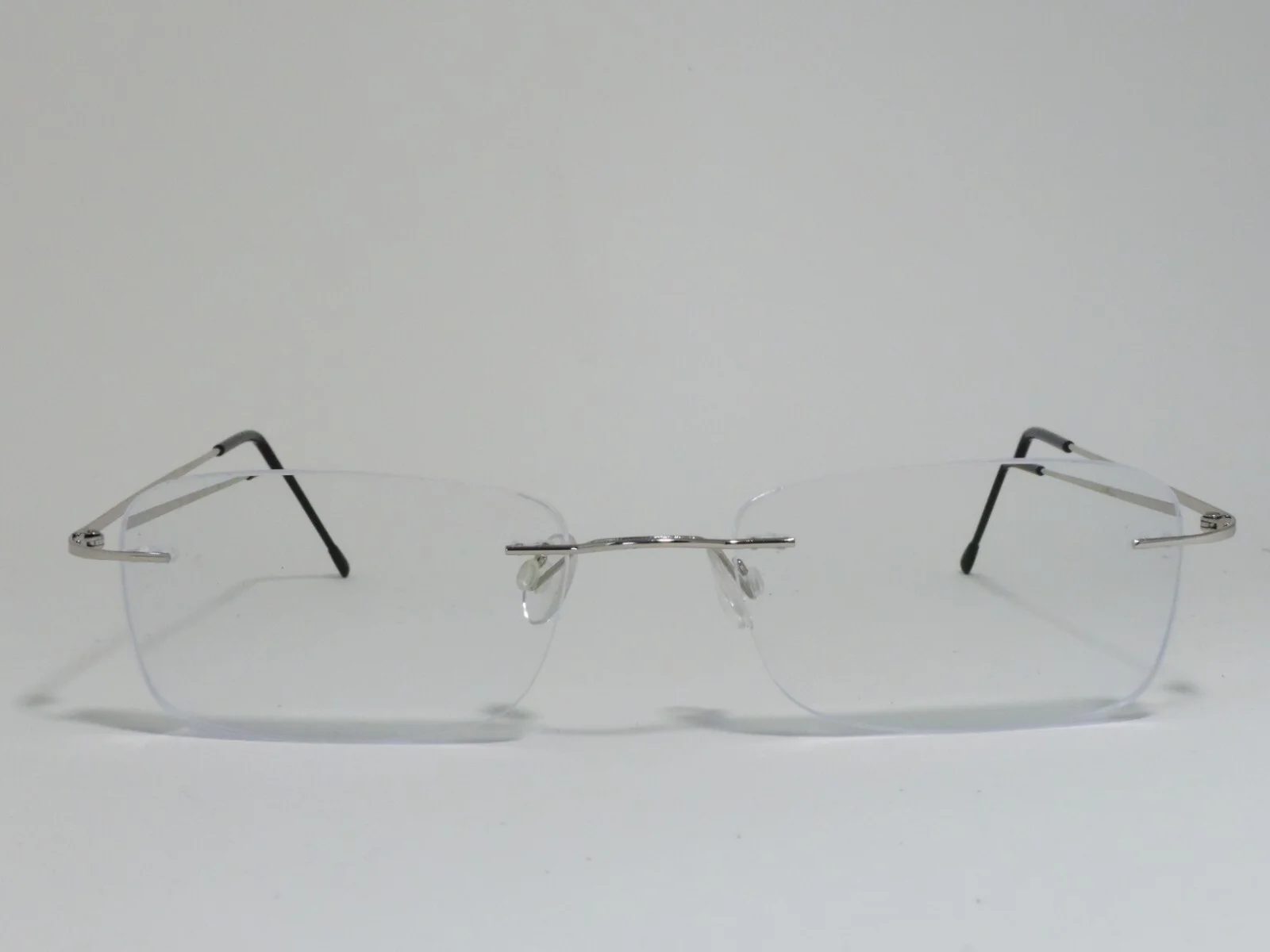 REVEL DWAYNE THIN METAL RECTANGULAR RIMLESS EYEGLASS FRAMES SILVER 53-18-145 NEW
