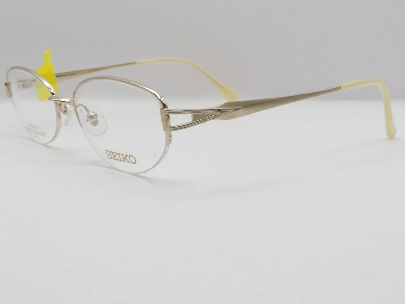 SEIKO T3118 TITANIUM OVAL HALF RIM EYEGLASS FRAMES 001 GOLD 53-17-139 2