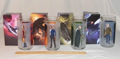 Set 4 2009 Star Trek movie collectible glasses: Kirk, Spock, Uhura, Nero; UNUSED