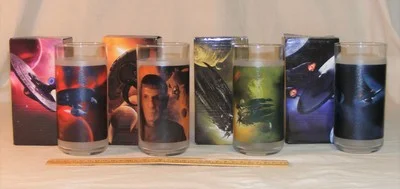 Set 4 2009 Star Trek movie collectible glasses: Kirk, Spock, Uhura, Nero; UNUSED 2