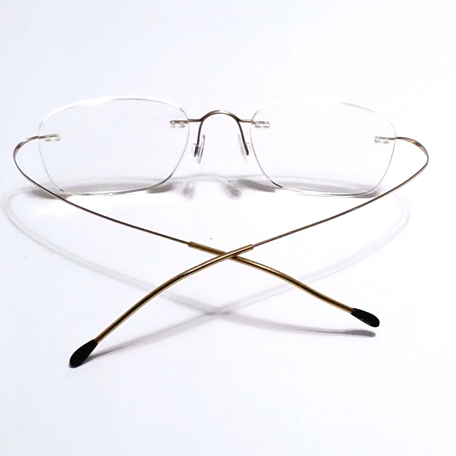 SILHOUETTE EYEGLASSES TITANIUM MINIMALST HINGLESS RIMLESS GOLD 7395 20 6051 160 1