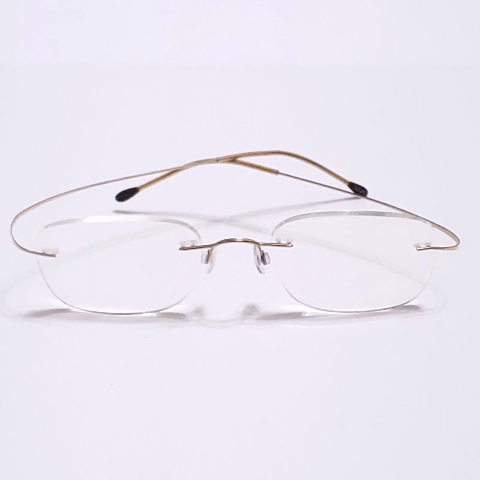 SILHOUETTE EYEGLASSES TITANIUM MINIMALST HINGLESS RIMLESS GOLD 7395 20 6051 160 2