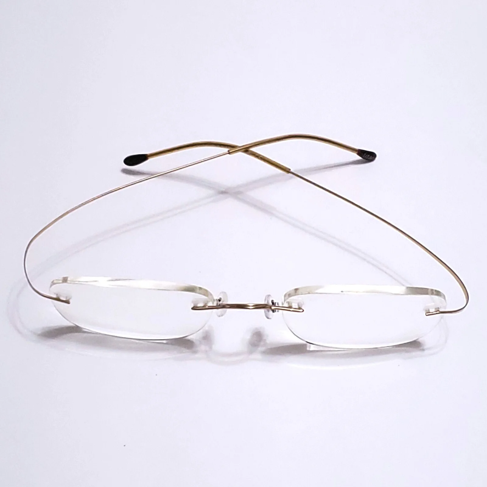 SILHOUETTE EYEGLASSES TITANIUM MINIMALST HINGLESS RIMLESS GOLD 7395 20 6051 160 3