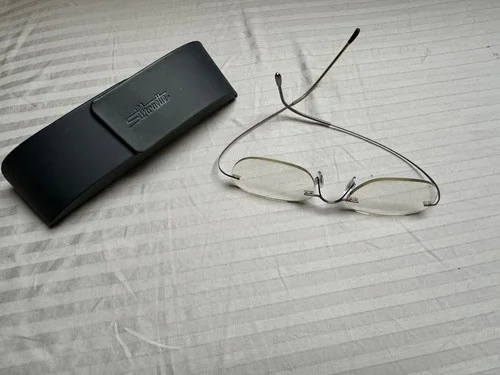 SILHOUETTE Titanium Rimless Eyeglass Frame, #7799 TMA Must, True Gold, 21-150