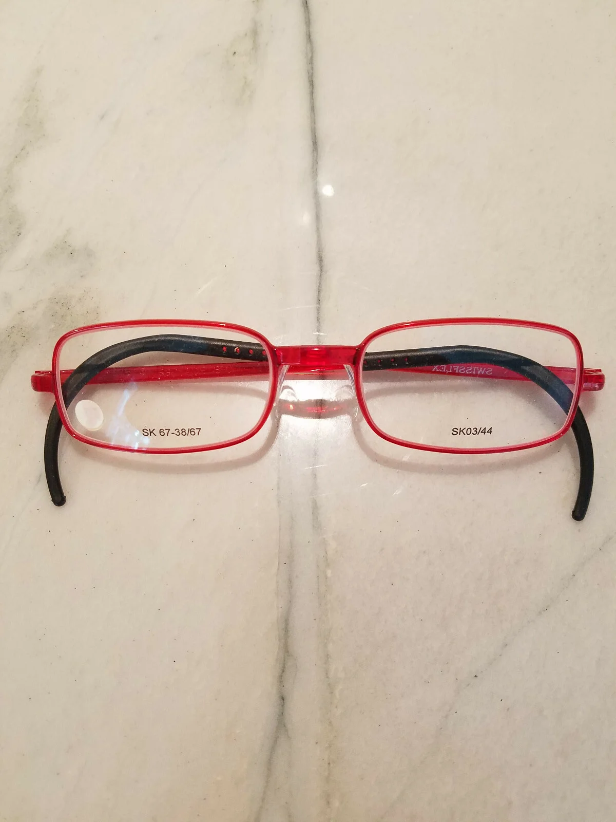 Swiss Flex kids frame Red with adjustable cable temples oval shape