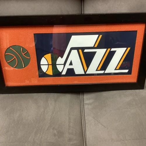 UTAH JAZZ BASKETBALL 21” X 10 1/2” GLASS FRAMED ART WORK