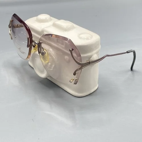 Vintage MARCHON MARCOLIN Eyeglasses Womens 54 16 135 Frameless Rose Tint Italy