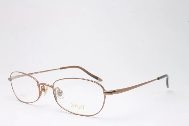VINTAGE SAKI MOD 676 TITANIUM COP EYEGLASSES SIZE: 50-18-140