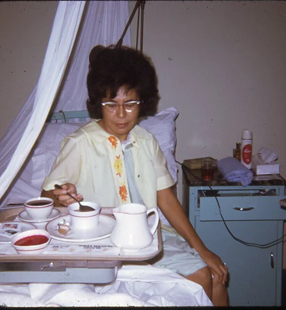WOMAN WITH CATS EYE GLASSES SITTING IN HOSPITAL BED EATING 1973 PHOTO SLIDE