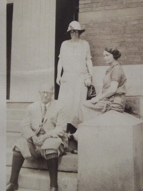 WOMAN WITH WEIRD ROUND EYE GLASSES ON STEPS Vintage 1910 2